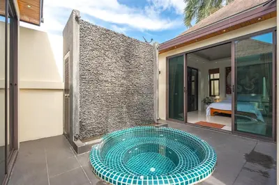 a swimming pool in the middle of a house at V232 Private 4BR Pool Villa Near Big Buddha&Gym in Chalong