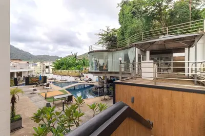 a view of a building with a swimming pool at C229 1BR Studio Sea View 850m to Beach Gym in Patong Beach