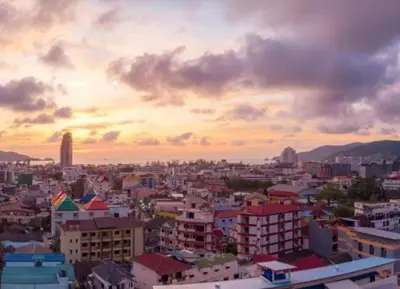 a view of a city at sunset at C229 1BR Studio Sea View 850m to Beach Gym in Patong Beach