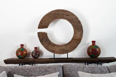 a large wooden number on a table with vases at Andaman Paradise 1 - Luxury 3-Bedrooms Pool Villa in Rawai Beach