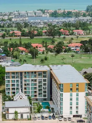 an aerial view of a resort building and a golf course at C231 Brand-New 1BR Prime Spot Pool&Gym Near Beach in Bang Tao Beach