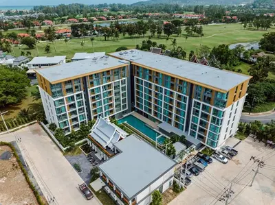 an overhead view of a building with a pool at C231 Brand-New 1BR Prime Spot Pool&Gym Near Beach in Bang Tao Beach