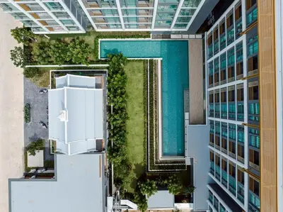an aerial view of a building with a yard at C226 Brand-New Top Location Near Beach Clubs in Bang Tao Beach