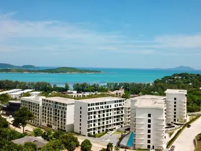 an aerial view of a resort with the ocean in the background at Stylish studio on Rawai beach in Rawai Beach