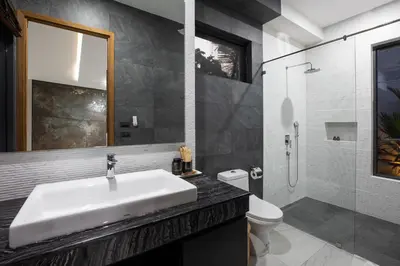 a bathroom with a sink and a toilet and a shower at Andaman Paradise 2 Luxury 4 Bedrooms Pool Villa in Rawai Beach