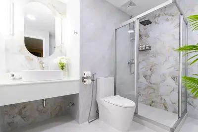 a bathroom with a toilet and a sink and a shower at Patong Tower 2 Bedroom Sea View 8 Floor in Patong Beach