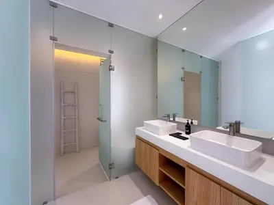 a bathroom with two sinks and a large mirror at Sumptuous Duplex Pool Villa 3BR in Newly Built LuxPride 4 L12 Residence in Bang Tao Beach