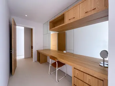 a home office with a wooden desk and a chair at Sumptuous Duplex Pool Villa 3BR in Newly Built LuxPride 4 L12 Residence in Bang Tao Beach