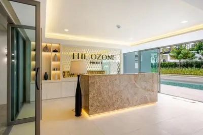 a lobby of a store with a counter and a window at The Ozone Condotel Phuket BangTao Beach Spacious 1-BR in Laguna Phuket