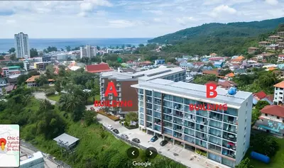 an aerial view of a building in a city at CHIC CONDO - Best mountain view near Karon beach in Karon Beach