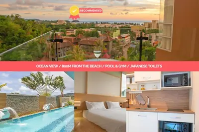 a hotel website with a picture of a bedroom and a pool at SeaView 1BR Apartment at Karon Beach in Karon Beach