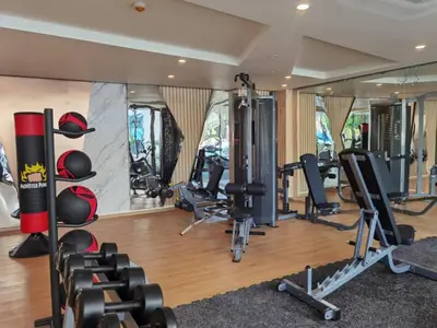 a gym with several treadmills and weights at Modern studio in Rawai 600m from the beach in Rawai Beach
