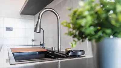 a kitchen sink with a pan and a pot on it at Quiet & Comfy studio near Rawai Beach - 