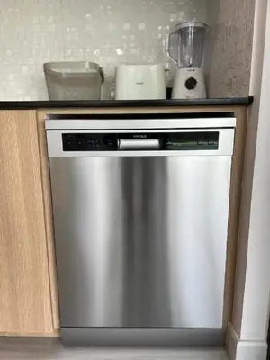 a kitchen counter with a stainless steel dishwasher at Joy Villa - Luxury 4 bedroom villa in Ban Saiyuan (1)