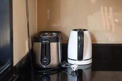 a coffee machine sitting on top of a counter at Orchid Villa - 3 Bedrooms Pool Villa - Rawai beach in Rawai Beach
