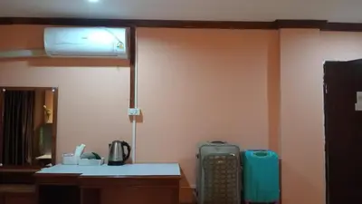 a room with a room with a heater and a room with a room at Haweli Restaurant & Guest House in Ao Nang Beach
