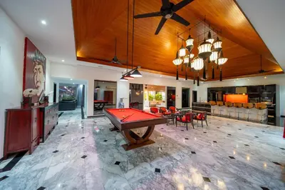 a large living room with a pool table in it at Luxurious 8bedroom villa in Bangtao Large private pool Group vacation villa Free maid and private kitchen service Extended in Bang Tao Beach
