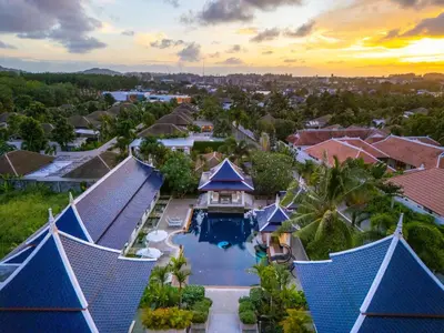 an aerial view of a house with a swimming pool at Luxurious 8bedroom villa in Bangtao Large private pool Group vacation villa Free maid and private kitchen service Extended in Bang Tao Beach