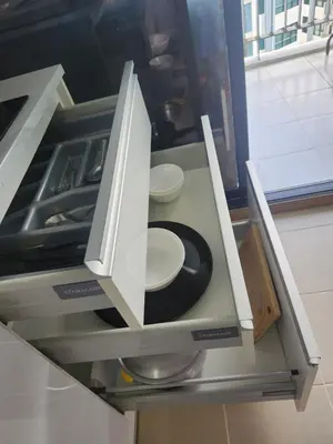 an open kitchen drawer with a plate in it at Cen 1 bed room861 in Phuket Town