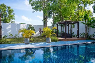 a swimming pool with a gazebo and trees at Bang Tao 6-bedroom large private pool modern Balinese style leisure holiday villa BBQ family group the park in Bang Tao Beach