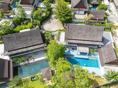an overhead view of a building with a swimming pool at Bang Tao 6-bedroom large private pool modern Balinese style leisure holiday villa BBQ family group the park in Bang Tao Beach