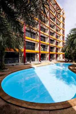a large swimming pool in front of a building at Nature View Residence in Ban Mai Salae