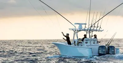 a group of people on a fishing boat in the ocean at Nature View Residence in Ban Mai Salae
