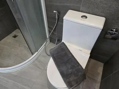 a bathroom with a toilet with a pillow on it at Seabreeze Suite 1-Bed T3-637 in Phuket Town