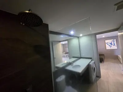 a bathroom with a sink and a mirror at Sea Side Haven 1 Bed T2-621 in Phuket Town