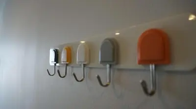 a row of orange and white icebreakers on a wall at Urban Tide Studio T3 -626 in Chalong