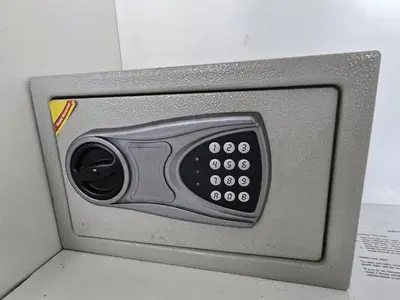 a microwave oven with a remote control in it at 1 BR Condo in good location NV402 in Phuket Town