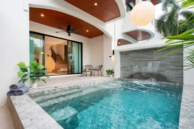 a swimming pool in a house with a villa at At Bangla Patong Pool Moon villa in Patong Beach