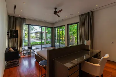 a living room with a couch and a table at Villa Princess Maria in Kata Beach