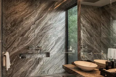 a bathroom with a large marble wall at Villa Princess Maria in Kata Beach
