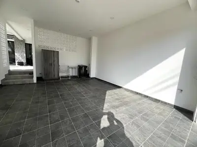 a shadow of a person standing in an empty room at Villa Lola - Modern 3 Bedrooms Villa with Pool in Ban Saiyuan (1)