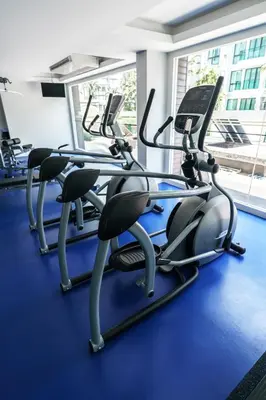 a gym with treadmills and elliptical machines at New 1 Bdr Royal Lee Nayang beach in Ban Bo Han