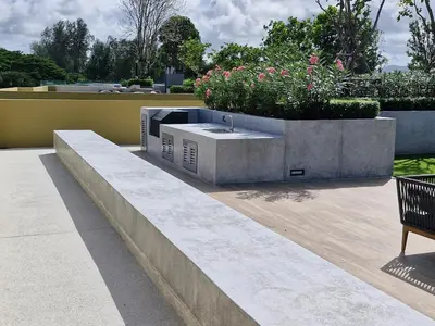 a concrete sink with a planter on a patio at Laguna Residence, Pool View in Bang Tao Beach