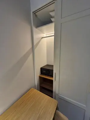 a small closet with a table and a door at Laguna Residence, Pool View in Bang Tao Beach