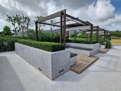 a garden with a pergola on a patio at Laguna Residence, Pool View in Bang Tao Beach