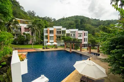 an image of a swimming pool at a resort at 3-BR Condo Mountain & Pool view, Pool & Gym access - Kamala Hills G201 in Kamala Beach