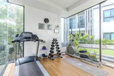 a room with a gym with a treadmill and a gym at C232 Prime spot Pool Gym Near Beach&Boat Ave in Bang Tao Beach