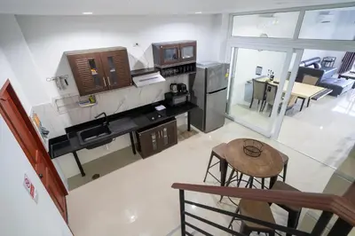 an overhead view of a kitchen and a living room at Rawai Pool House with 3 Bedrooms in Ban Saiyuan (1)
