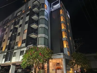 a building with a sign on the side of it at Chalong Bay - One bedroom on 7 Floor at Tower 1 in Ban Klang