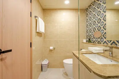 a bathroom with a toilet and a sink at The Ozone Condominium 514 one bedroom in Laguna Phuket