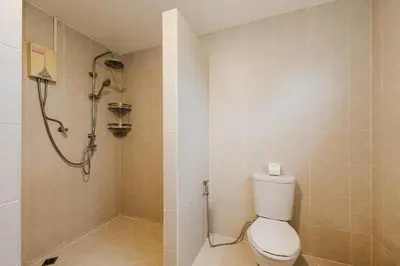 a bathroom with a toilet and a shower at Family Sea View Holiday Pool Villa, Saiyuan Phuket in Ban Saiyuan (1)