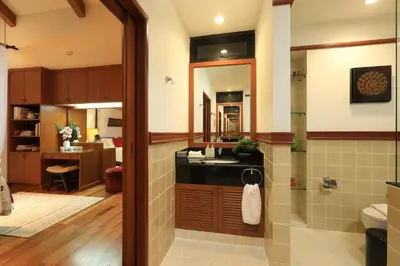 a bathroom with a sink and a toilet at Laguna Golf View Pool Villa in Ban Thalat Choeng Thale
