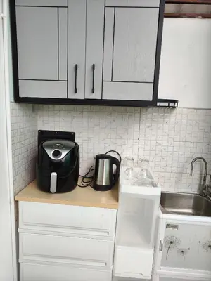 a kitchen counter with a toaster and a sink at Kata beach weivs in Kata Beach
