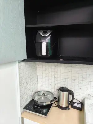 a kitchen counter with a pot and a coffee maker at Kata beach weivs in Kata Beach