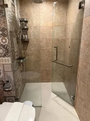 a shower stall with a toilet in a bathroom at Title 5 in Rawai Beach