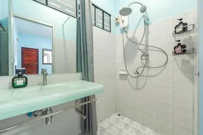 a bathroom with a sink and a shower at Areca Holiday Home 3, Karon Beach in Karon Beach